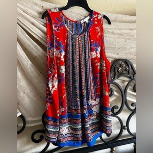 Gently used and well cared for sleeveless DR2 multicolored top, size XL